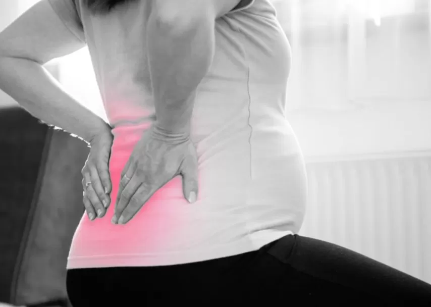 Đau lưng có phải sắp sinh không? 9 dau than kinh toa o ba bau.png